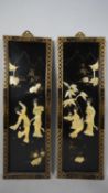 Two vintage Japanese lacquered wooden plaques with gilded borders, mounted with bone and mother of