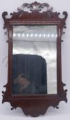 A Georgian mahogany fret carved pier mirror with original plate. H.69 W.40cm