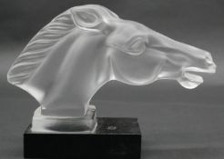 A Desna frosted glass horse head car mascot, the Art Deco style sculpture raised on a square black