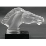 A Desna frosted glass horse head car mascot, the Art Deco style sculpture raised on a square black