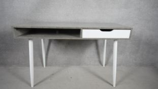 A retro vintage styled desk on splay supports. H.116 W.49 (cut to back as photographed).
