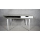 A retro vintage styled desk on splay supports. H.116 W.49 (cut to back as photographed).