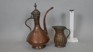 An 18th century copper samovar and vintage gadrooned copper jug. The samovar has a snake form handle
