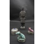 A collection of ceramics and a white metal box. Including a Tang style terracotta warrior statue and