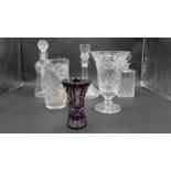 Collection of crystal and glass. Including two boxed cut crystal vases, a Bohemian amethyst cut to