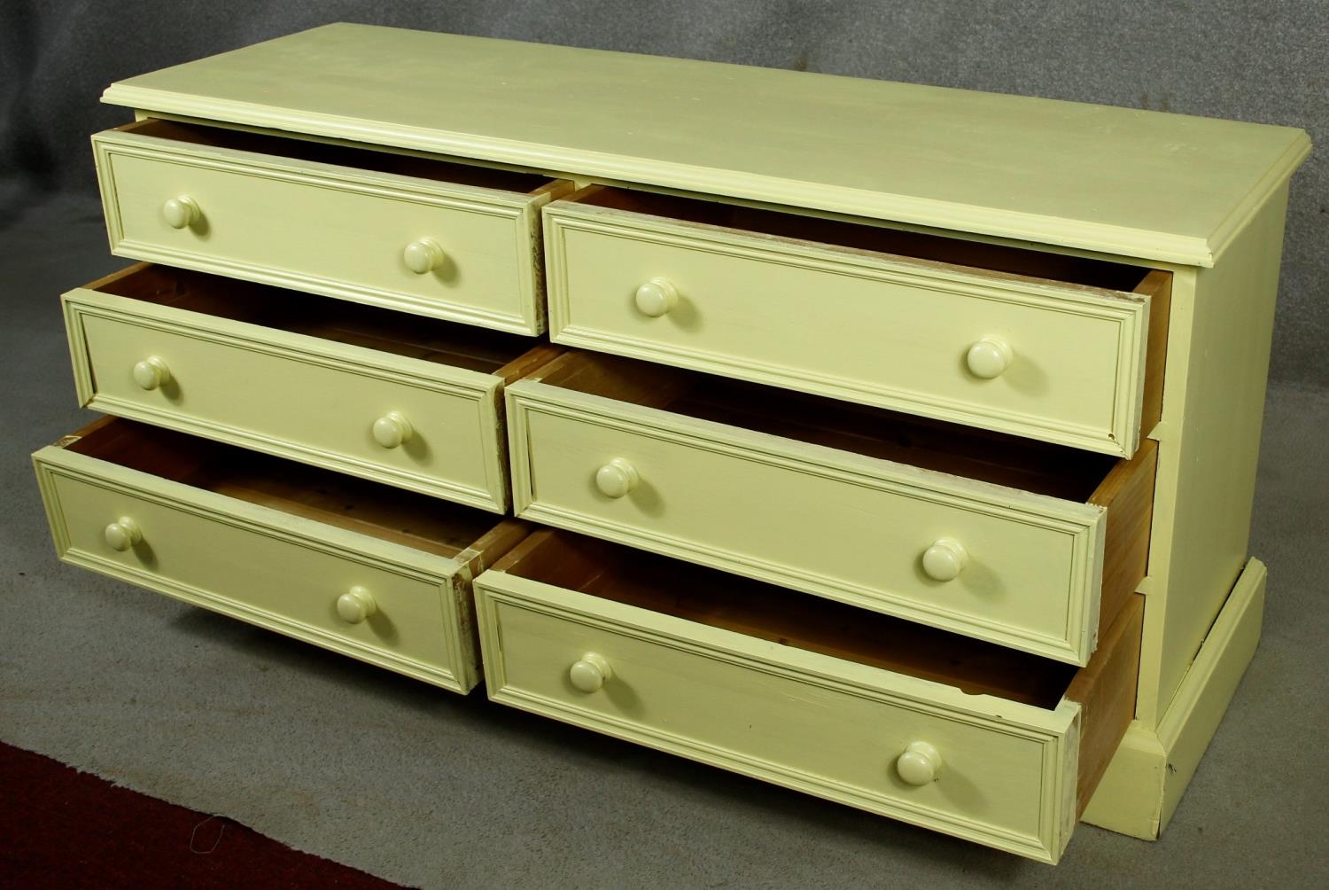 A Victorian style painted small chest of six short drawers on shaped bracket feet. H.65 W.133 D.41cm - Image 3 of 6