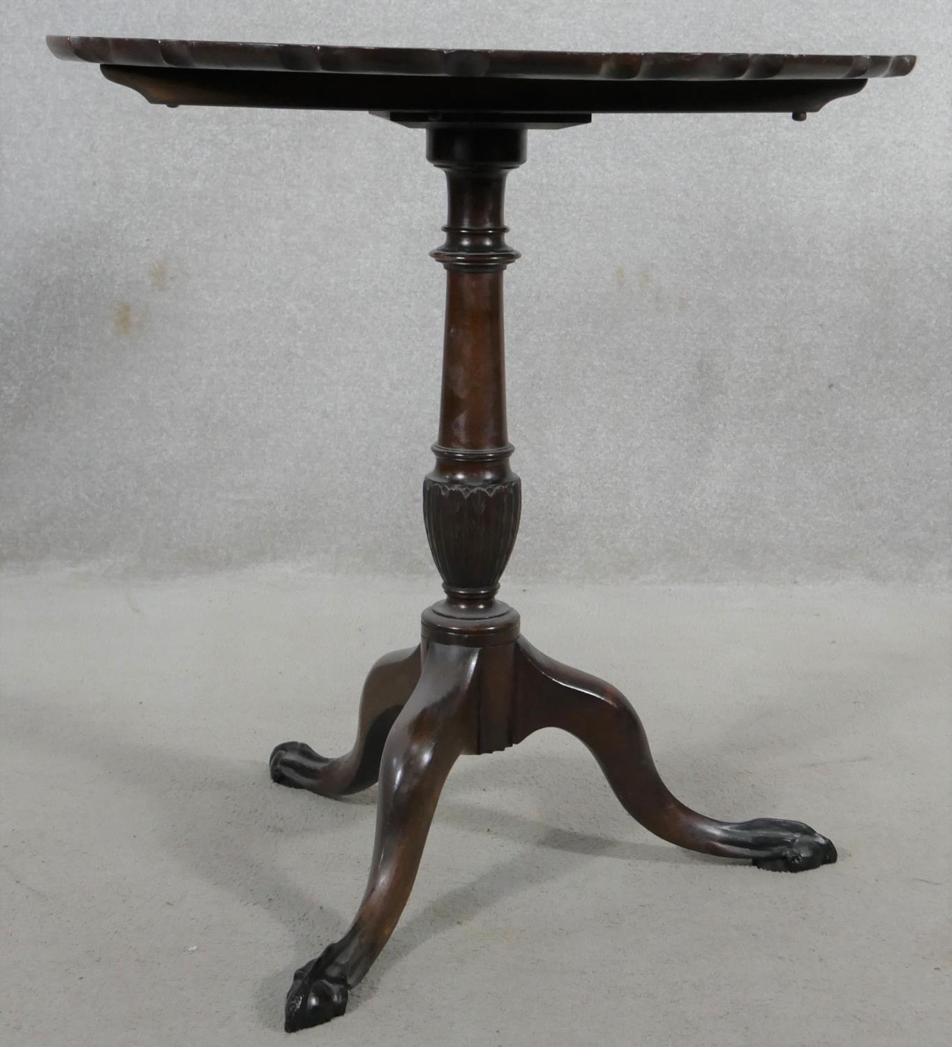 A Georgian style mahogany tilt top occasional table with pie crust edge on husk carved turned - Image 2 of 10