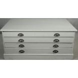 A vintage painted low plan chest of four drawers on plinth base. H.55 W.120 D.80cm
