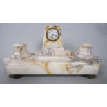 An Art Deco French veined marble desk set with clock, two ink wells and pen holder. The marble