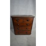 A Victorian mahogany chest of drawers on plinth base. H.106 W.100 D.48