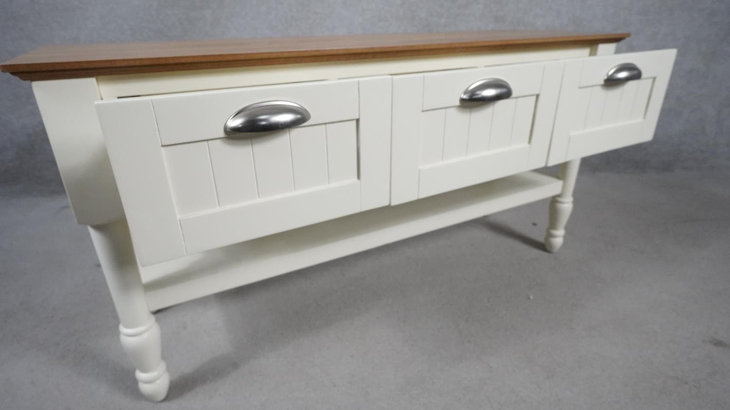 A small painted dresser with planked top above drawers on turned supports united by an under tier. - Image 4 of 7