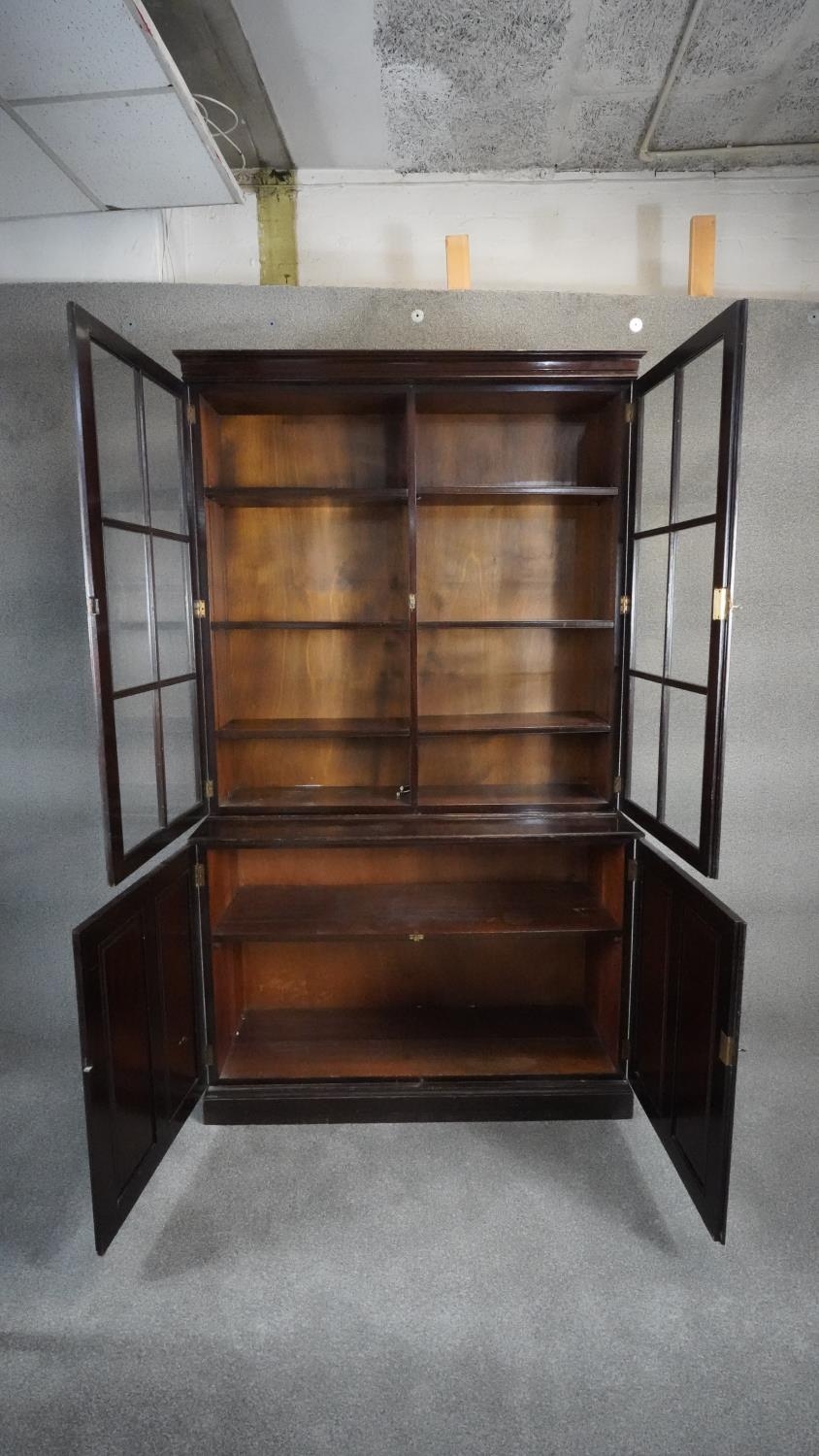 A mid century Georgian style mahogany library bookcase the upper glazed section above base fitted - Image 2 of 6