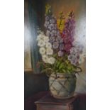 George Willis-Pryce (1866-1949), a framed oil on board, still life flowers in a vase standing on a