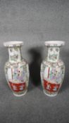 A large pair of Cantonese Late Quing- Republic period porcelain Famille rose hand painted vases.