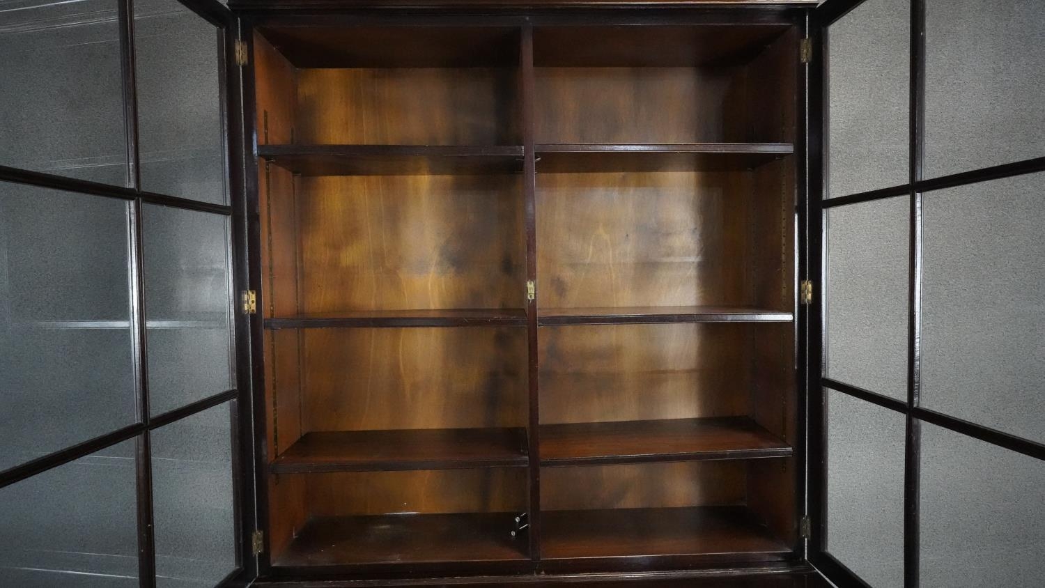 A mid century Georgian style mahogany library bookcase the upper glazed section above base fitted - Image 3 of 6