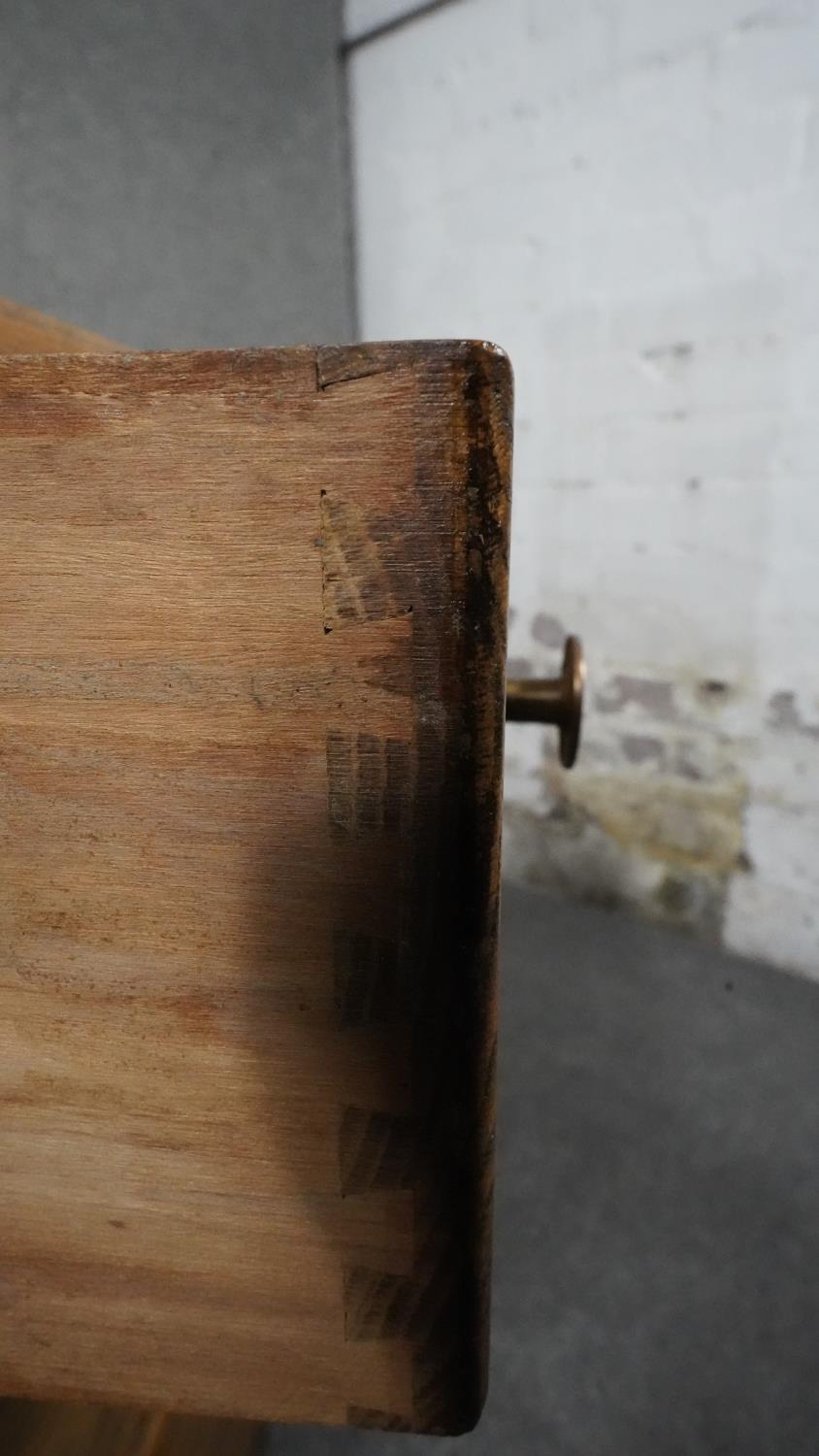 A mid century light oak three drawer pedestal chest on plinth base. H.63 W.35 D.46 - Image 5 of 7