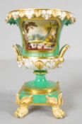 A C.1900 hand painted and gilded Sevres style porcelain twin handled urn on pedestal base with