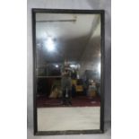 A full height wall mirror in ebonised moulded frame. H.192 W.108