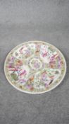 A large Cantonese late Qing - Republic period Famille rose porcelain hand painted charger. Decorated