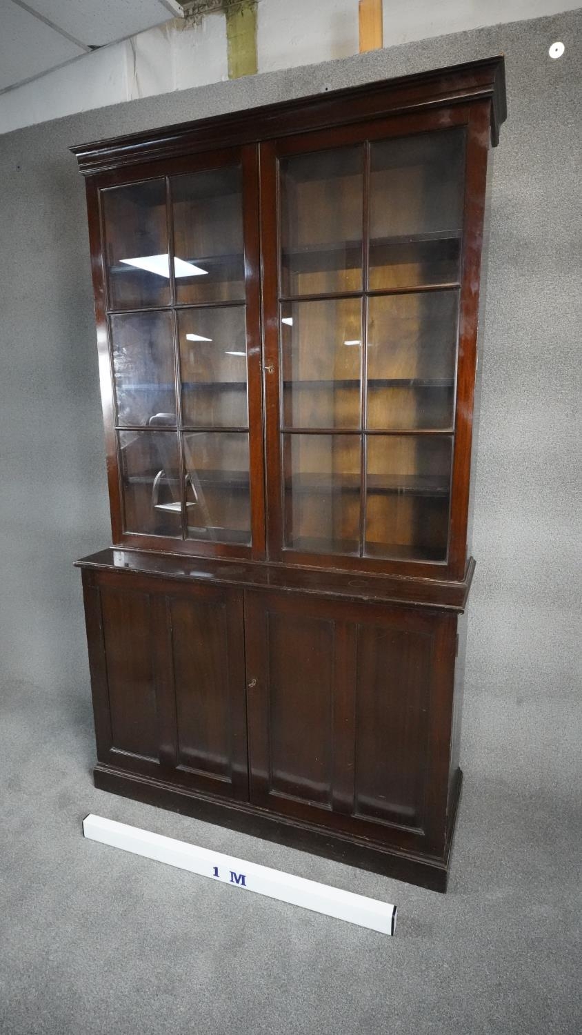 A mid century Georgian style mahogany library bookcase the upper glazed section above base fitted - Image 6 of 6