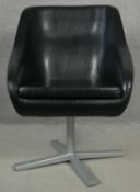 A retro vintage design swivel desk chair in faux leather upholstery on metal base. H.78cm