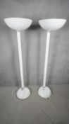 A pair of contemporary white metal standard uplighters. H.181 W.50 D.48