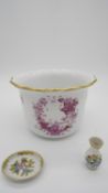 A Herend Porcelain Chinese bouquet Appoyi pink design cachepot along with a Herend Queen Victoria