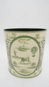 A Golfar & Hughes hand painted cream and green Toleware waste paper basket. Decorated with horses,