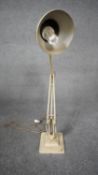 A vintage Herbert Terry Anglepoise cream enamel on metal table lamp, makers stamp.H.72