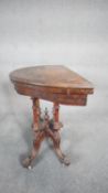 A Victorian burr walnut and satinwood inlaid demi lune card table with foldover top on quadruped