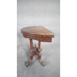 A Victorian burr walnut and satinwood inlaid demi lune card table with foldover top on quadruped