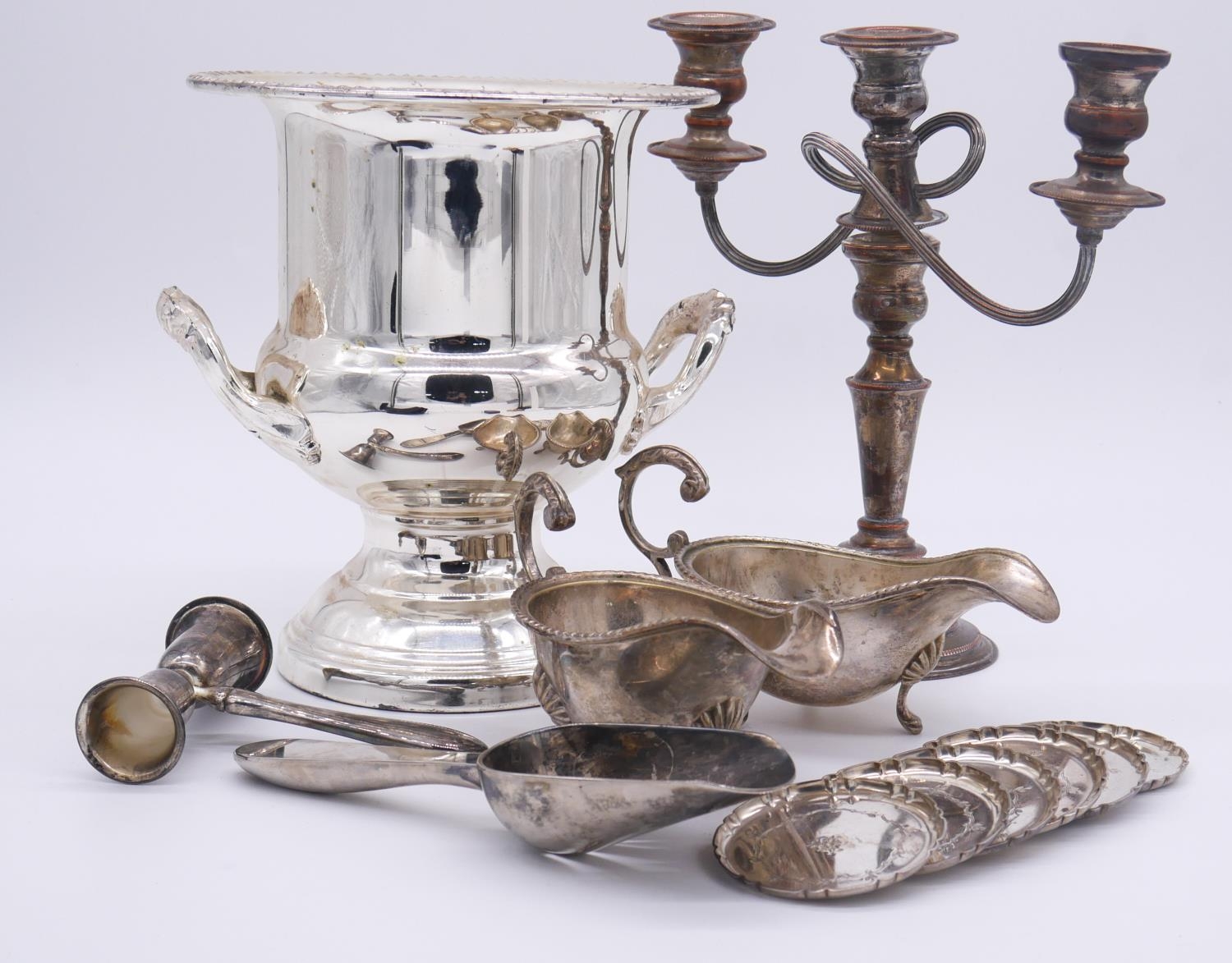 A collection of silver plate. Including a three branch candelabra, a two handled silver plate
