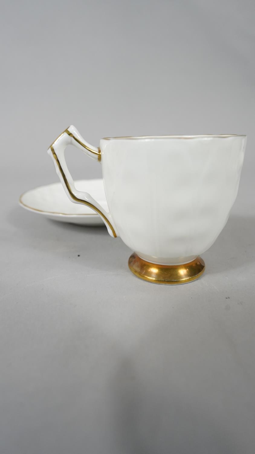 A set of six Aynsley porcelain gilded tea cups and saucers along with a boxed Edinburgh crystal - Image 7 of 11