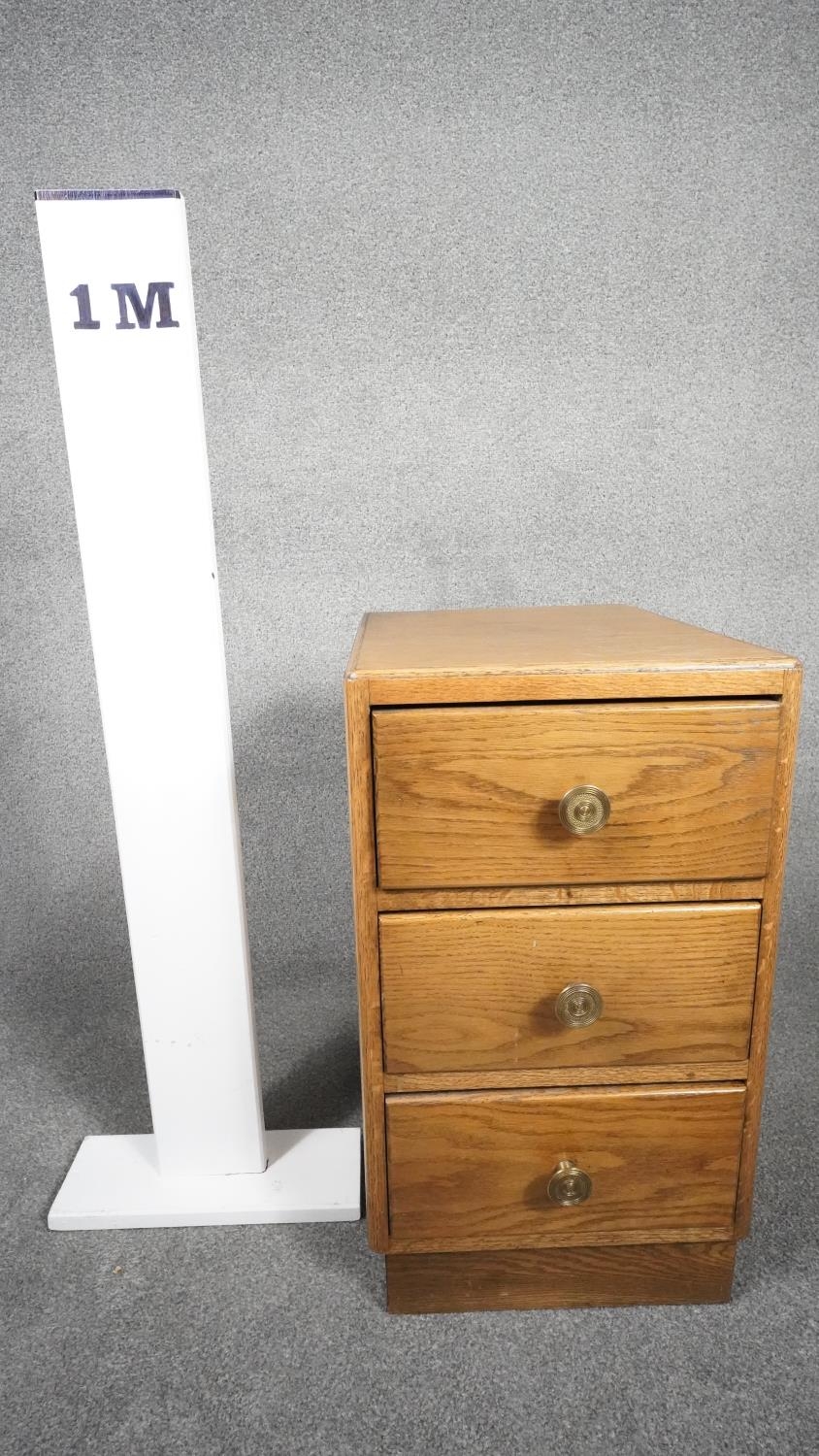 A mid century light oak three drawer pedestal chest on plinth base. H.63 W.35 D.46 - Image 7 of 7