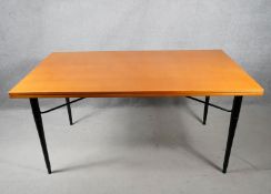 A 1950's vintage beech and ebonised dining table by A J Milne for Heal's. H.73 W.103 D.91
