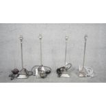 Four Contemporary chrome table lamps with square bases. H.50 W.15