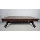 A 19th century rosewood, satinwood and ebony marquetry topped low table on bobbin stretchered