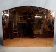 A mid century Art Deco style peach glass overmantel or wall mirror with etched floral and ballet