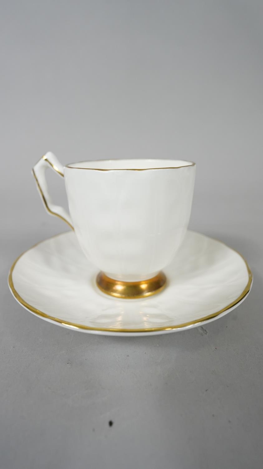 A set of six Aynsley porcelain gilded tea cups and saucers along with a boxed Edinburgh crystal - Image 6 of 11