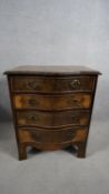 A Georgian style mahogany serpentine fronted small chest of drawers. H.77 W.61 D.41