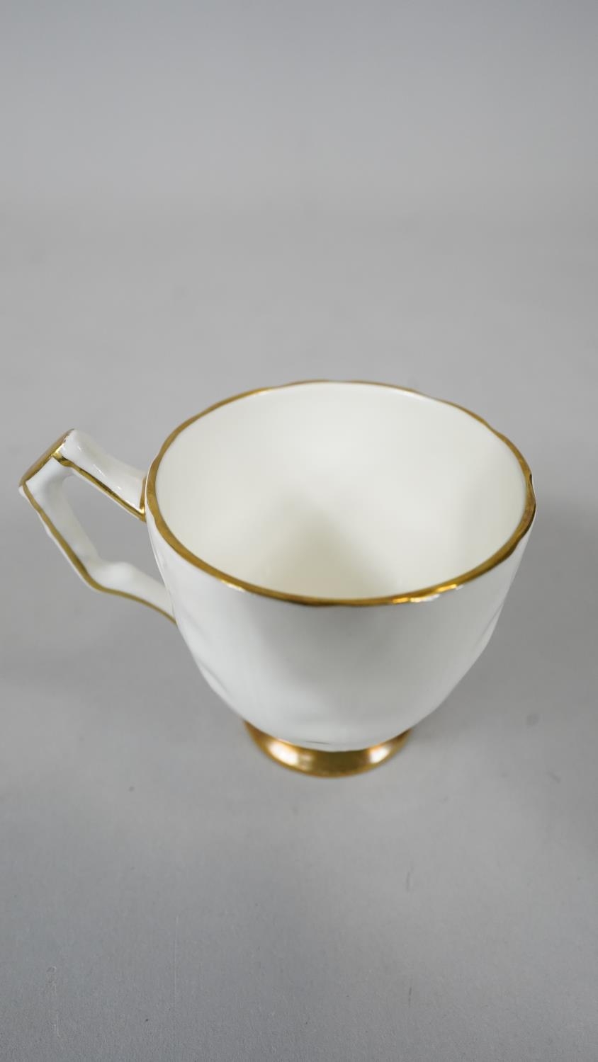 A set of six Aynsley porcelain gilded tea cups and saucers along with a boxed Edinburgh crystal - Image 8 of 11