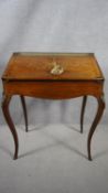 A late 19th century rosewood Louis XV style bureau de dame with pierced brass back rail and fall