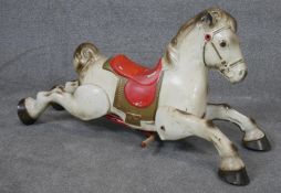 A vintage painted cast metal horse from a children's rocking horse. H.48cm