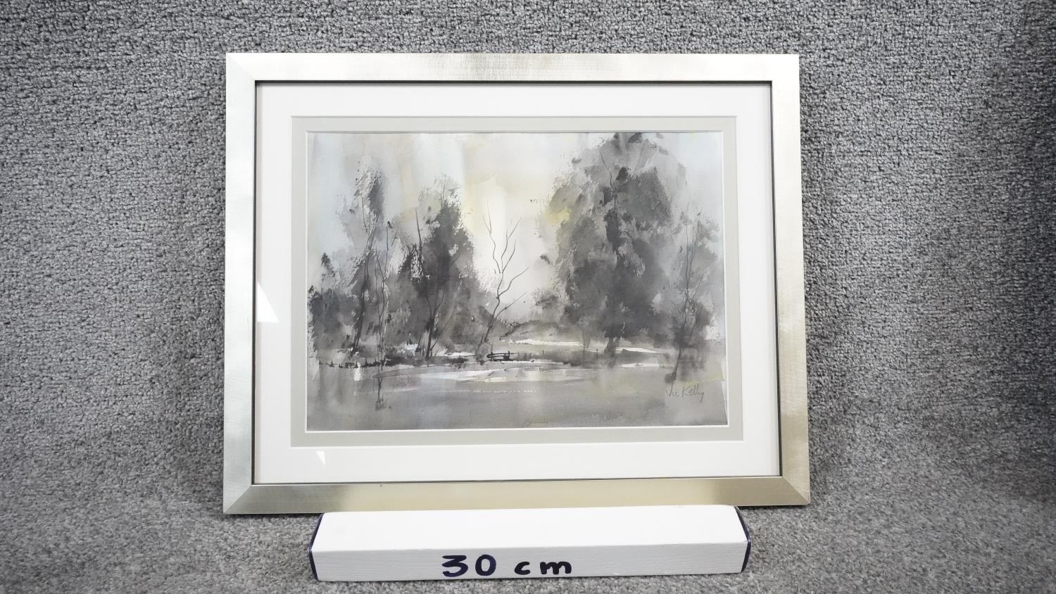 Victor Kelly RBSA, PPBWS - A framed and glazed watercolour on paper of a winter lake with trees. - Image 2 of 6