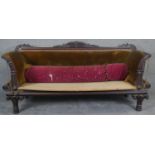 An Irish Regency sofa with carved mahogany frame, in need of reupholstery. H.97 W.210 D.70cm
