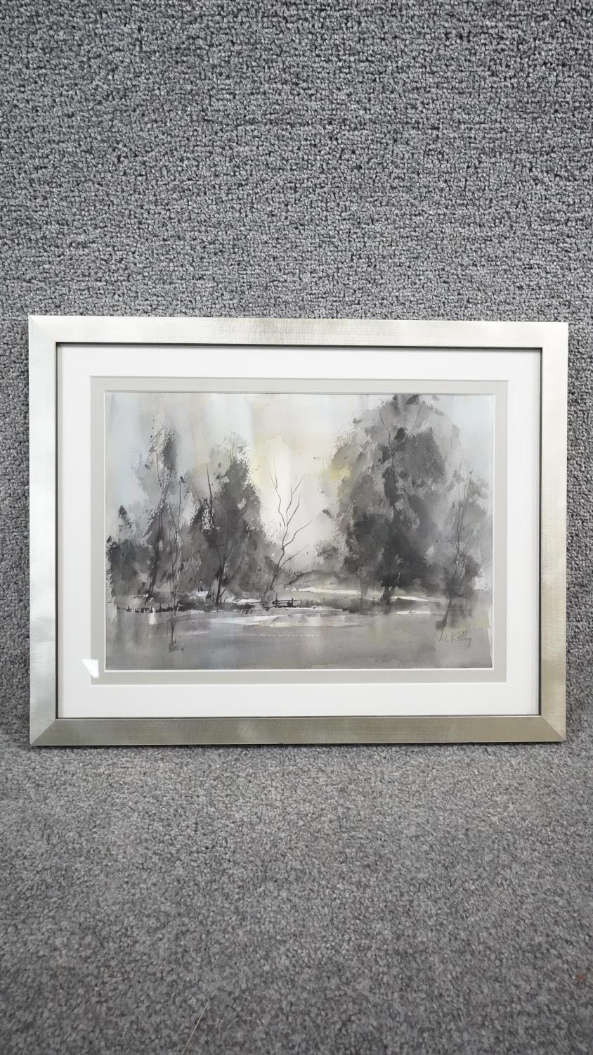 Victor Kelly RBSA, PPBWS - A framed and glazed watercolour on paper of a winter lake with trees. - Image 3 of 6