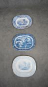 Three large blue and white 19th century transfer design meat platters, one with blue willow