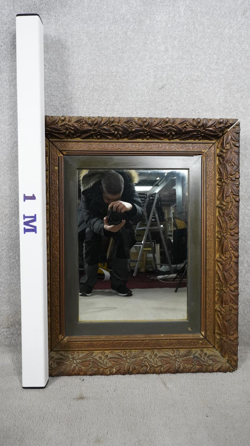 A 19th century giltwood wall mirror in floral gesso decorated frame. H.80 W.64 - Image 6 of 6