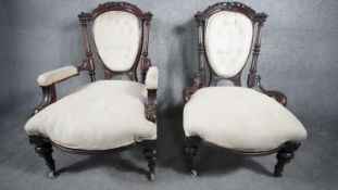 A Victorian carved mahogany framed armchair in buttoned upholstery along with the matching nursing