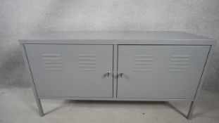 A retro industrial style metal two door side cabinet. H.63 W.18 D.40cm